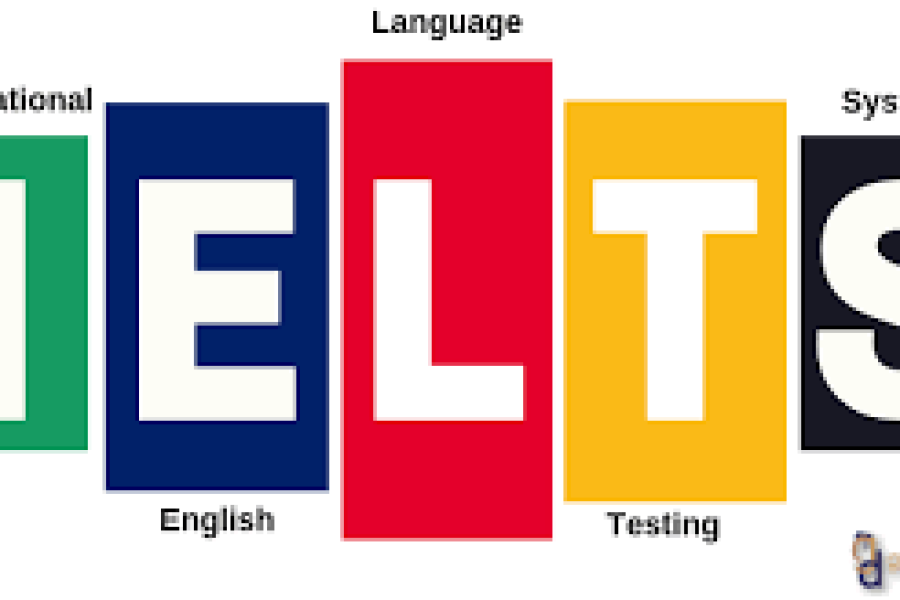 Confident student sitting at a desk, focused on taking the IELTS test on a laptop in Semarang